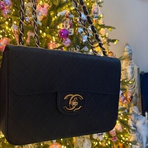 Elegant Black Quilted Shoulder Bag with Gold Details